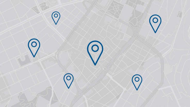 Bản đồ có nhiều điểm đánh dấu vị trí màu xanh trên nền xám nhạt.