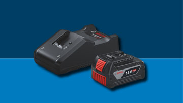 Bộ sạc màu đen và pin 18V trên nền xanh dương, hiển thị rõ ràng.