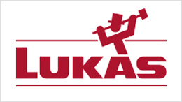 LUKAS-ERZETT Vereinigte Schleif- und Fräswerkzeugfabriken GmbH & Co. KG Logo của Lukas với chữ màu đỏ và hình ảnh chiếc búa.